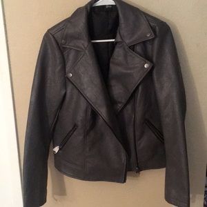 Never worn. Does not come with original tags.